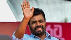 National People's Power (NPP) presidential candidate Anura Kumara Dissanayaka gestures during an election rally ahead of the presidential election, in Dehiowita on September 17, 2024. 