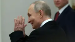 Путин