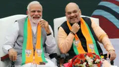 નરેન્દ્ર મોદી અને અમિત શાહ