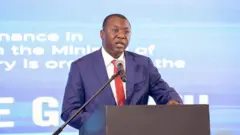 finance minister Dr Amin Adam