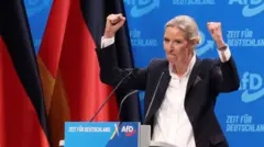 Алис Вейдель на трибуне 