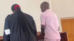 Ishimwe Dieudonné n'umwunganizi we imbere y'urukiko