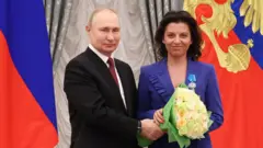 Vladimir Putin and Margarita Simonyan