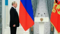 Путін