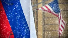 Флаги России и США в снегу