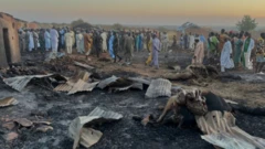 People at the scene of airstrikes