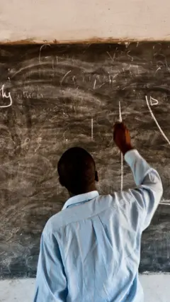Man writing on the board