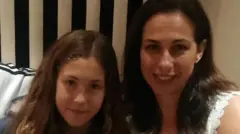 Ayelet sits next to her daughter Naama