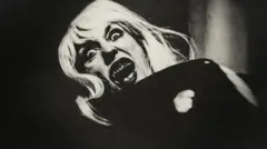 Portrait of a female vampire shortly before the bite