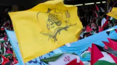 The flag of the Fatemiyoun Brigade in the Iranian capital, Tehran.