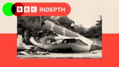 Wreckage of the Air India Boeing 787-8 Dreamliner plane sits on the open ground