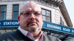 Close of Dan Biddle outside Edgware Road station