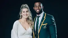 Siya Kolisi and im wife Rachel Smith bin pose for Mercedes Benz Building ahead of di 2020 Laureus World Sports Awards on February 17, 2020 for Berlin, Germany.