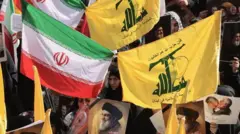 پرچم ایران و حزب‌الله راهپیمایی تهران