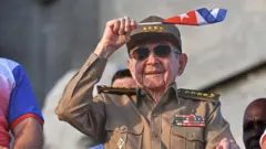Cuba's former President Raul Castro (R) and former Vice-President Jose Ramon Machado Ventura attend a May Day rally marking International Workers' Day in Havana on May 1, 2026.