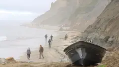 ኣብ ገምገም ባሕሪ ዘለዉ ሰባት