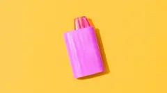 purple vape on yellow background