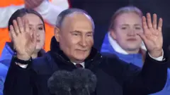 Путин на концерте, посвященном 10-летию аннексии Крыма