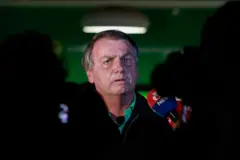 Jair Bolsonaro cercadolampions bet donofiguras escuras