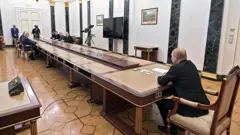 путін