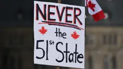 Cartaz em manifestação em Ottawa