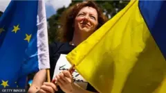 україна