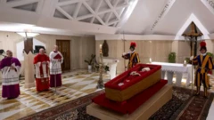 Pope Francis in an open casket