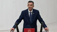 Ümit Dikbayır TBMM kürsüsünde konuşurken 