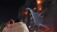 Hong Kong'taki yangından sonra acılı  bekleyiş: 'Sağ da, ölü de olsa eşimi çıkartmak istiyorum' 