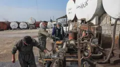 Three men dey work on oil plant for middle east