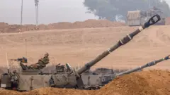 Israeli soldiers prepare for the scenario of ground maneuvres at an undisclosed location near the border with Gaza, in Israel, 28 October 2023