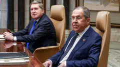 Радник президента Росії з питань зовнішньої політики Юрій Ушаков і міністр закордонних справ Росії Сергій Лавров