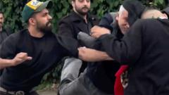 حمله شرکت‌کنندگان در عزاداری رئیسی به مخالفان حکومت ایران در لندن