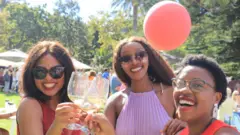 Women dey drink wine for Cape Town