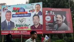 ঢাকার ফার্মগেট এলাকায় টাঙানো নির্বাচনী ব্যানার। গত ডিসেম্বরের ছবি 