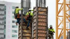 Trabalhadores em uma construção