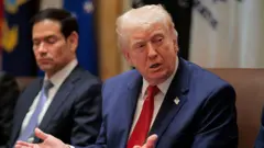 President Donald Trump during di Cabinet meeting wey hold for White House Cabinet Room on March 26, 2026 for Washington, DC. Dis na Trump second Cabinet meeting for 2026 and di first one since United States and Israel don start to attack Iran on February 28.