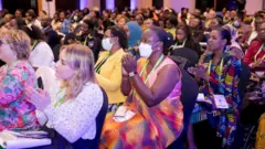 Abagore bakoraniye mu nama ya Women's Forum i Kigali muri CHOGM 2022