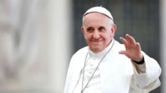 Pope Francis waving im hand