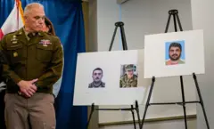 عکس رحمان‌الله لکنوال در کنار تصاویری دو گارد ملی امریکا