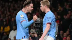 Man City players celebrate