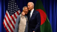 ড. মুহাম্মদ ইউনূস ও জো বাইডেন 