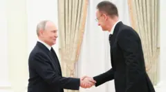 Путин и глава МИД Венгрии Сийярто