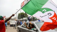 PDP flag wit pesin inside car
