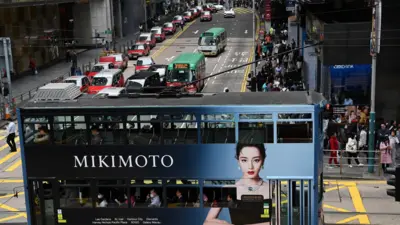 A tram passes by in the Central business district of Hong Kong on February 27, 2024, a day ahead of the city's annual budget to be announced on February 28.