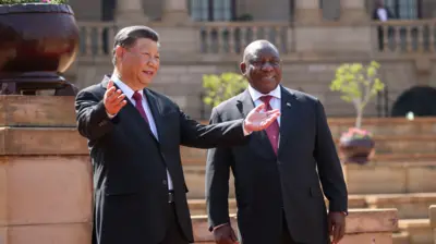 O presidente sul-africano Ramaphosa (D) e o presidente chinês Xi se encontramslots gratuitosPretória, África do Sul,slots gratuitos2023