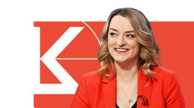 Laura Kuenssberg with red background and initials LK