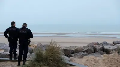 French police look at the Channel