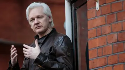 Julian Assange on a balcony at the Ecuador embassy