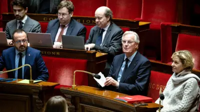 France's Prime Minister Michel Barnier and other politicians at the French National Assembly in Paris, France on 2 December 2024